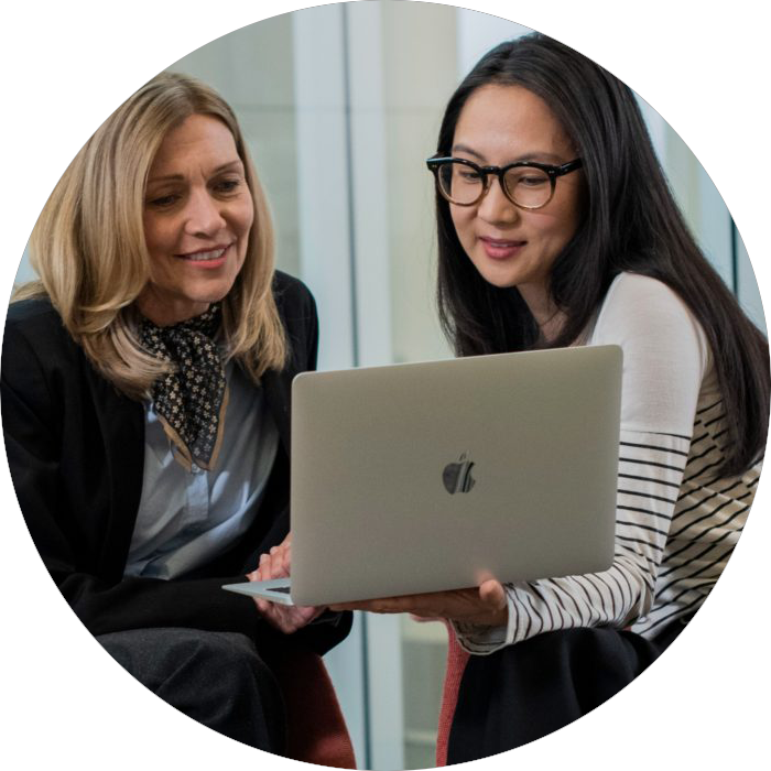 Staff using laptop to demonstrate a particular key software